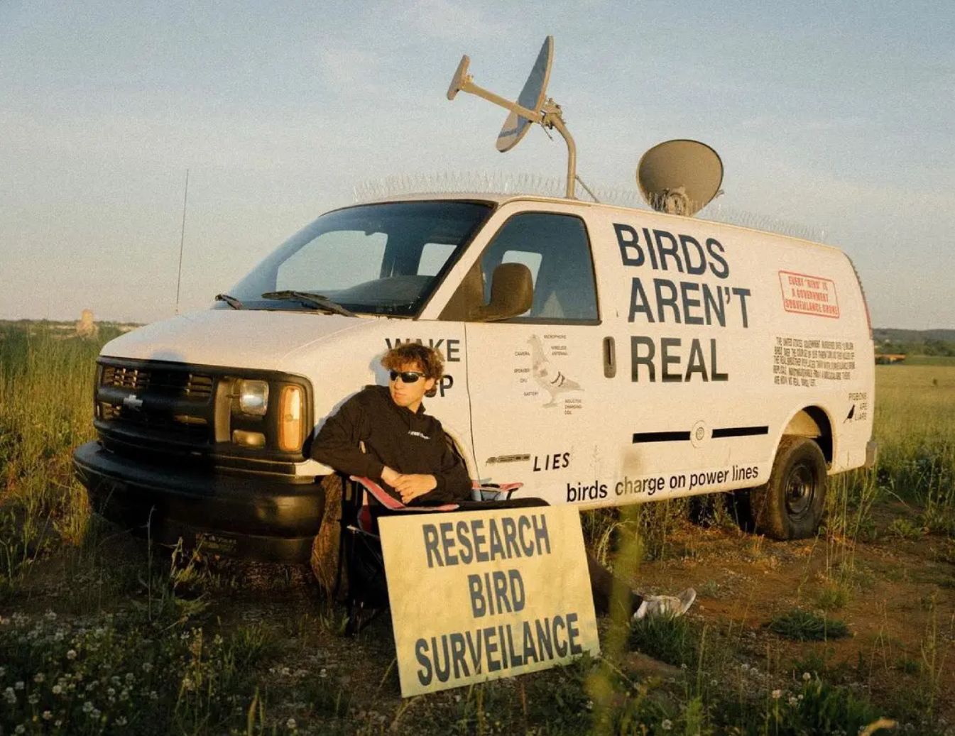 Birds Aren't Real founding member with van